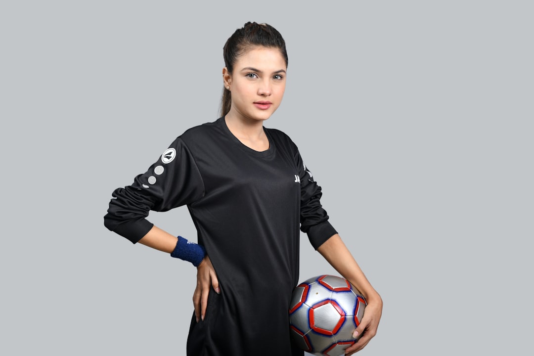 a person holding a ball