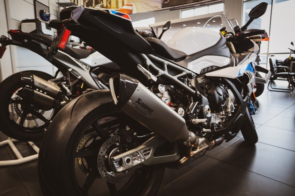 White and black sport motorcycle parked indoors