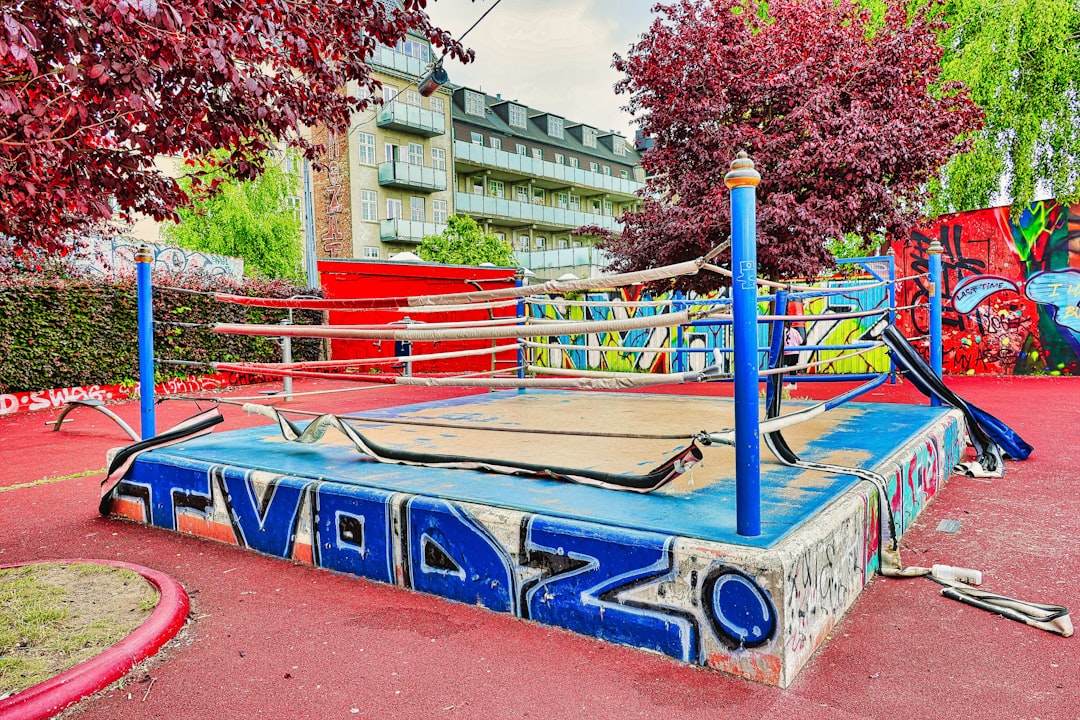 Graffiti-covered boxing ring in an outdoor setting