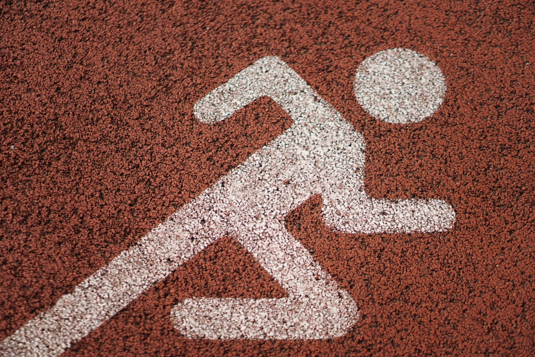 a handicap sign painted on a tennis court