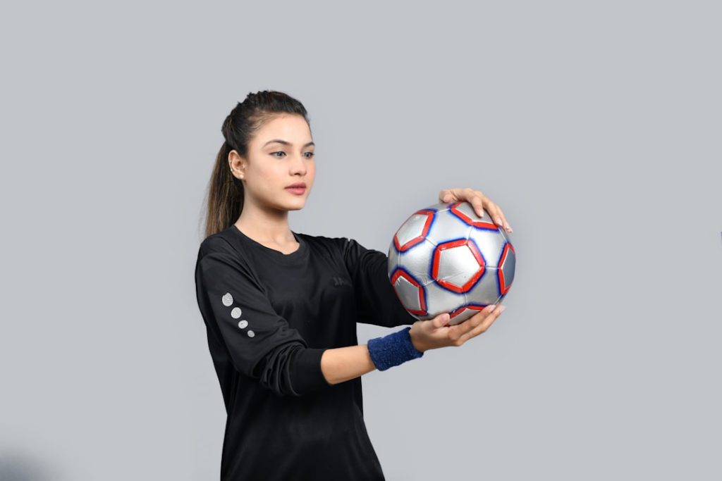 a person holding a ball
