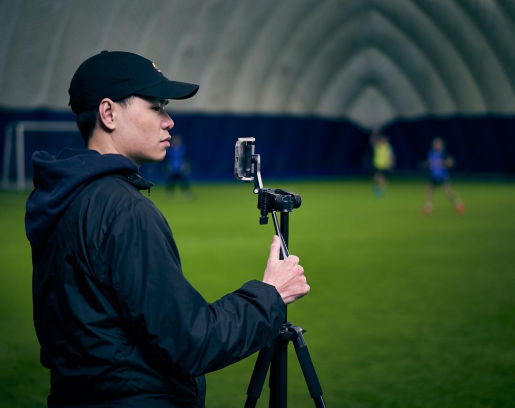 a man holding a camera
