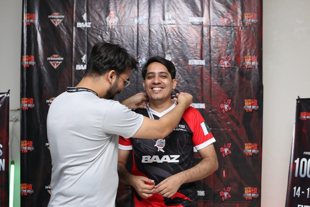 a couple of men standing next to each other