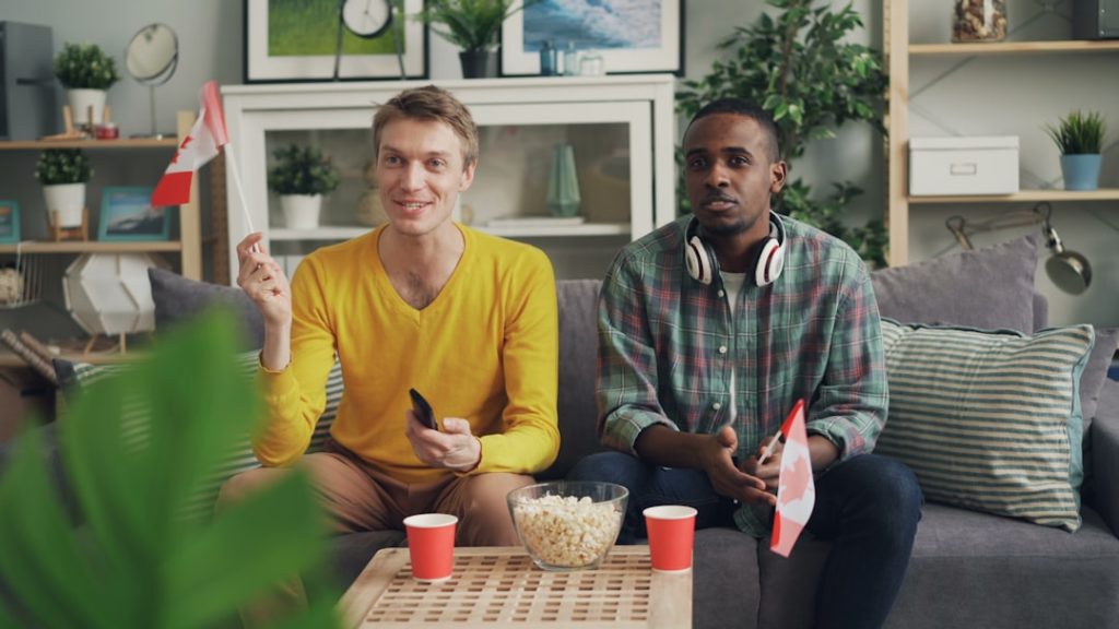 a couple of people sitting on a couch