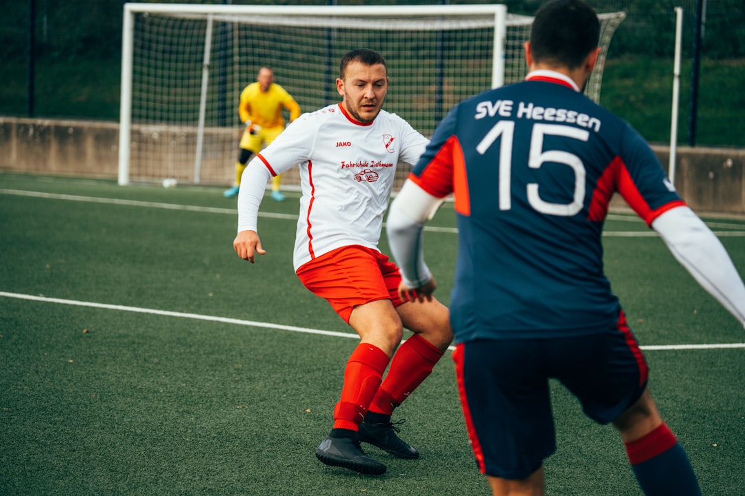 a group of young men playing a game of soccer