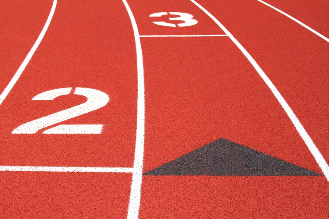 a close up of a running track with numbers on it