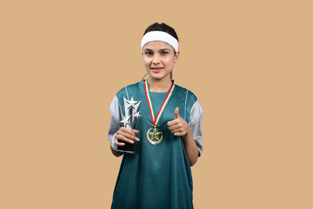 a person holding a trophy