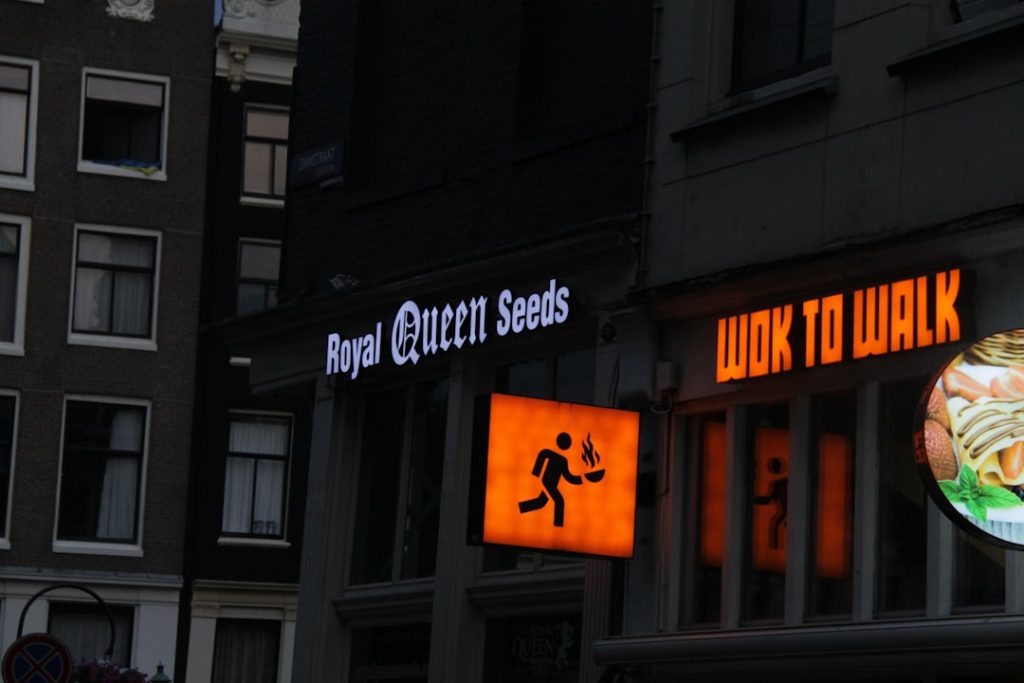 a neon sign on the side of a building