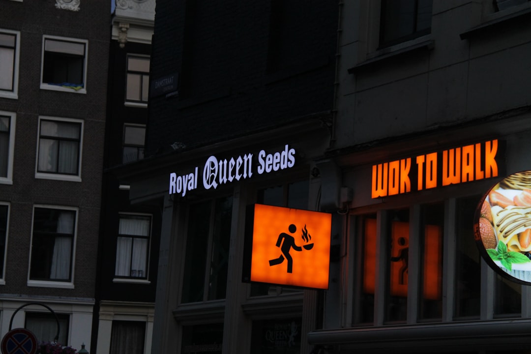 a neon sign on the side of a building