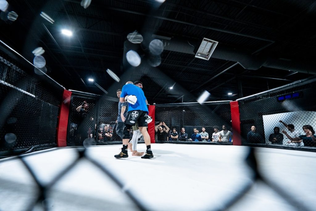 A couple of people in a boxing ring