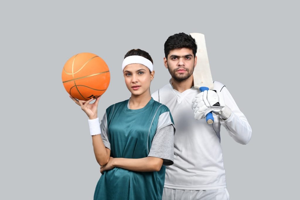a man and a woman holding a basketball