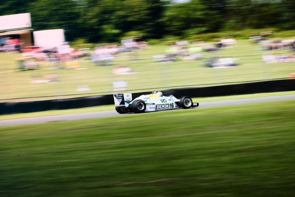 a racing car driving down a race track