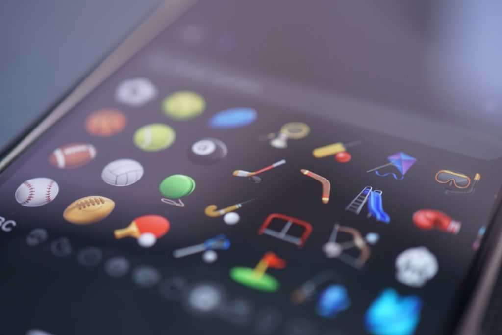 Sports icons are displayed on a phone's screen