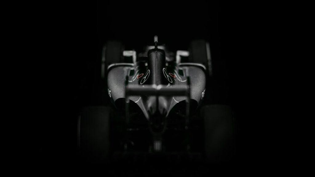a person sitting in a dark room