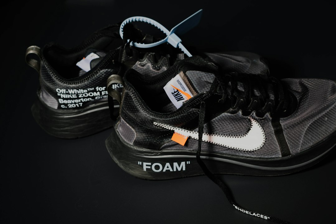 pair of gray Nike Off-White running shoes