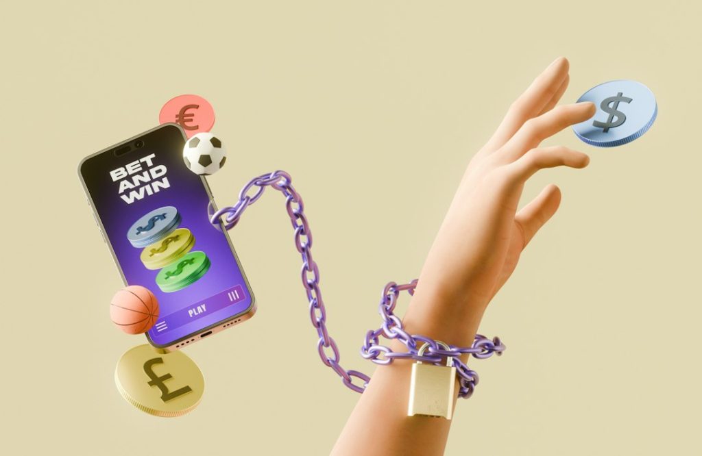 Gambling addiction concept with hand chained to a betting app