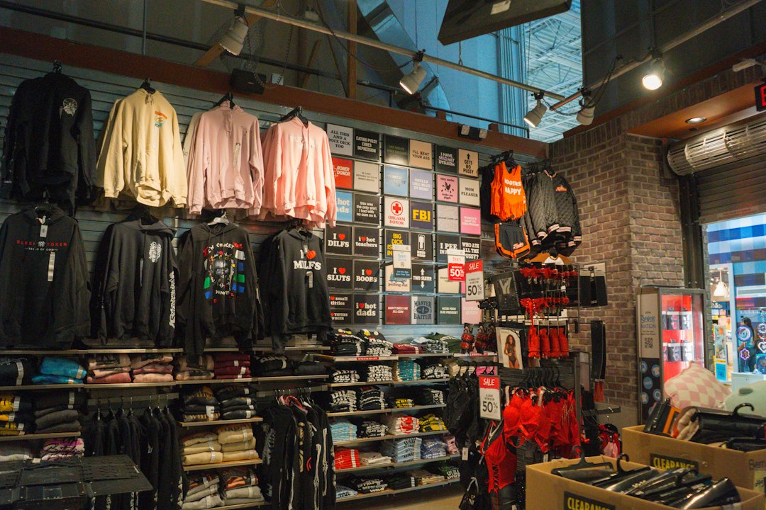 Clothing store interior with shirts and merchandise displayed