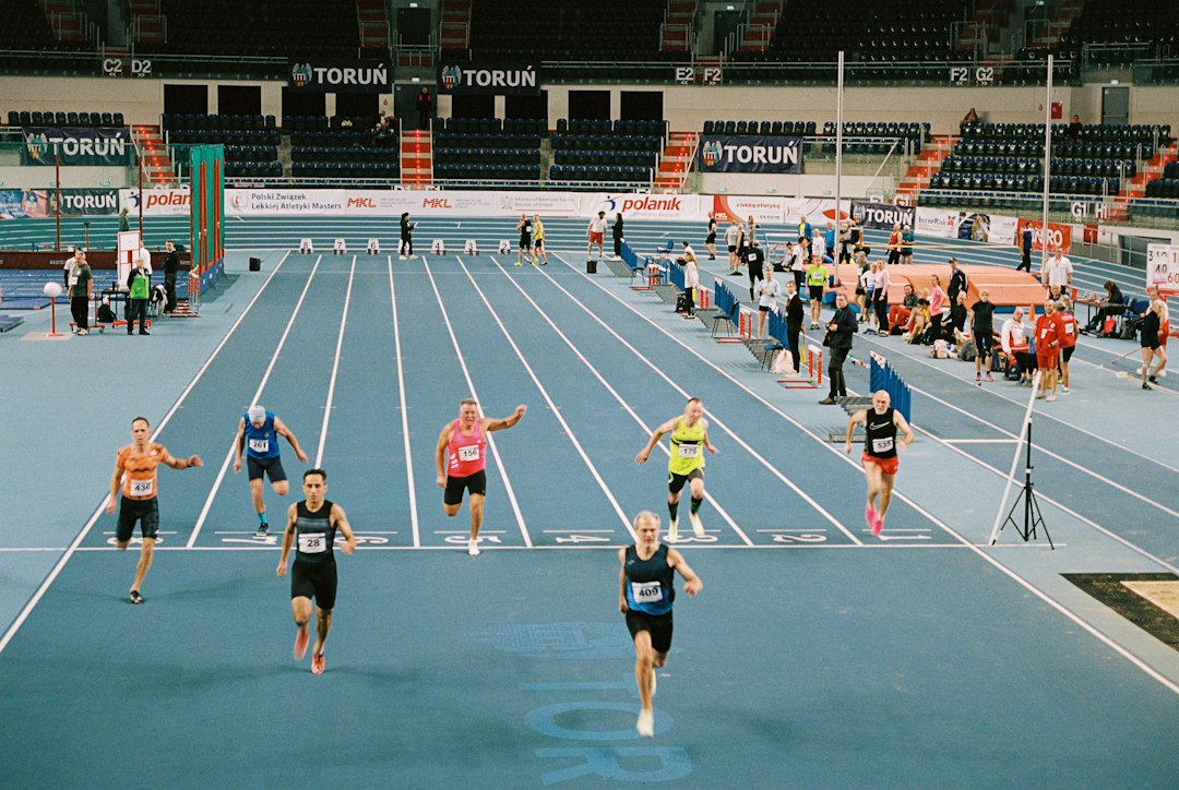 Runners compete in a track and field race